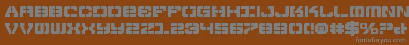 VyperBold-fontti – harmaat kirjasimet ruskealla taustalla