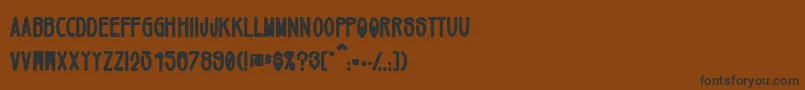 Czcionka Mikey ffy – czarne czcionki na brązowym tle