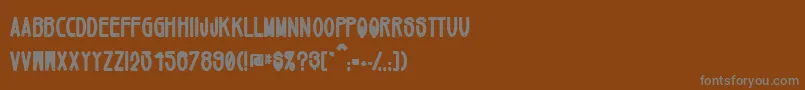 Mikey ffy Font – Gray Fonts on Brown Background