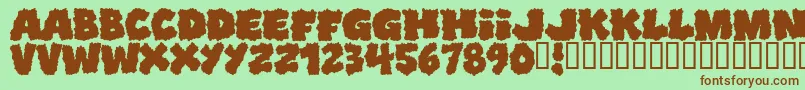 Shopliftersunite Font – Brown Fonts on Green Background
