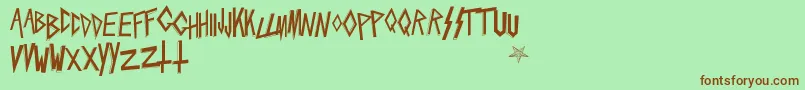 Slaytanic Font – Brown Fonts on Green Background