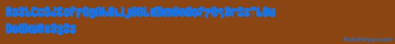 フォントBlowingBubble – 茶色の背景に青い文字