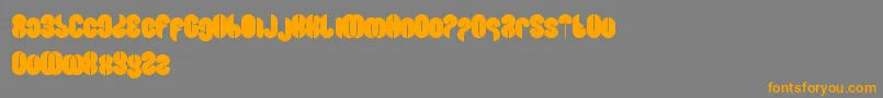 フォントBlowingBubble – オレンジの文字は灰色の背景にあります。