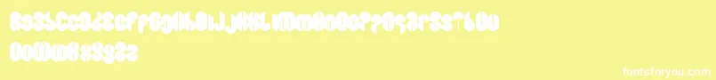 フォントBlowingBubble – 黄色い背景に白い文字