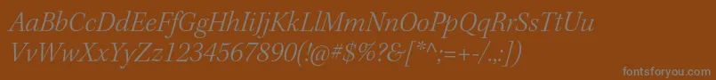KeplerstdLightitsubh-Schriftart – Graue Schriften auf braunem Hintergrund