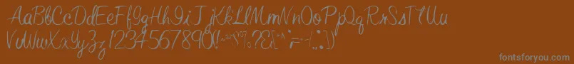 ElasticRegular Font – Gray Fonts on Brown Background