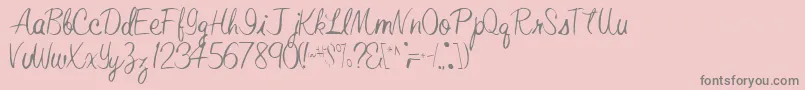 フォントElasticRegular – ピンクの背景に灰色の文字