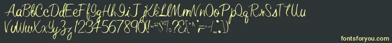 フォントElasticRegular – 黒い背景に黄色の文字