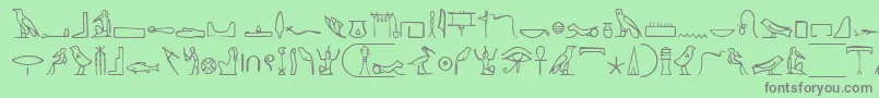 Fonte NahktHieroglyphs – fontes cinzas em um fundo verde