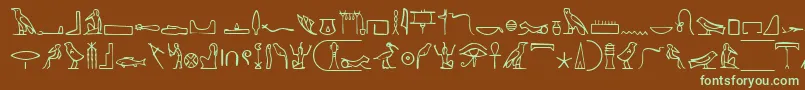 NahktHieroglyphs-fontti – vihreät fontit ruskealla taustalla