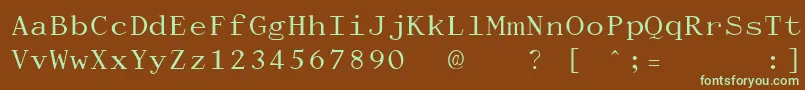 フォントDactylographeUnregistered – 緑色の文字が茶色の背景にあります。