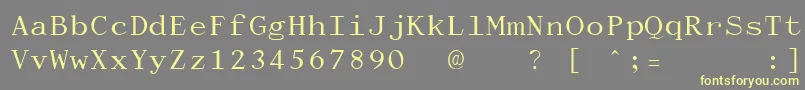 DactylographeUnregistered Font – Yellow Fonts on Gray Background