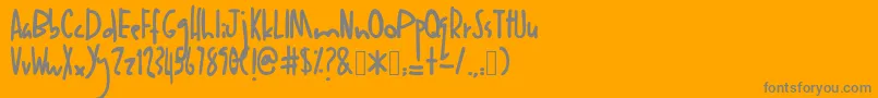 Anakanak-Schriftart – Graue Schriften auf orangefarbenem Hintergrund