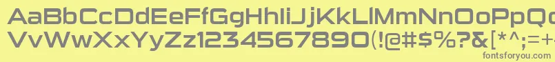 フォントSuiGenerisRg – 黄色の背景に灰色の文字