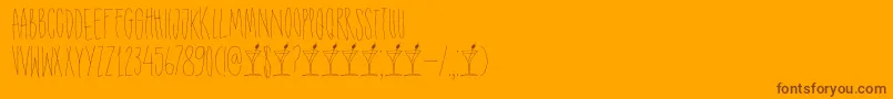Więcej informacji o czcionce DkShakenNotStirred Czcionka DkShakenNotStirred – brązowe czcionki na pomarańczowym tle