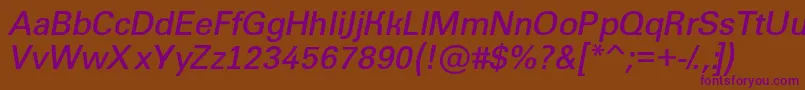 Groti11-fontti – violetit fontit ruskealla taustalla