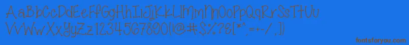MissSmartyPantsSkinny Font – Brown Fonts on Blue Background