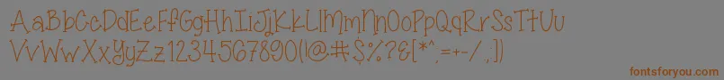 MissSmartyPantsSkinny Font – Brown Fonts on Gray Background