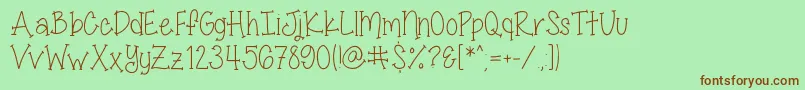 MissSmartyPantsSkinny Font – Brown Fonts on Green Background