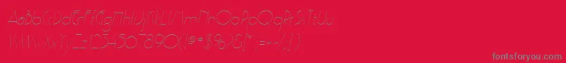 PoufSsiLightItalic-fontti – harmaat kirjasimet punaisella taustalla