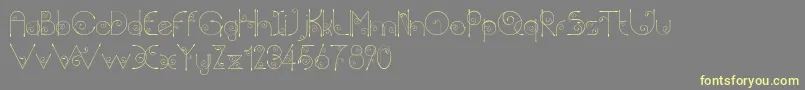 Chempaka Font – Yellow Fonts on Gray Background