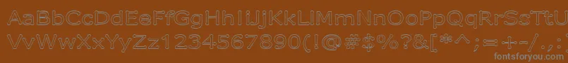 DrummonOutline Font – Gray Fonts on Brown Background