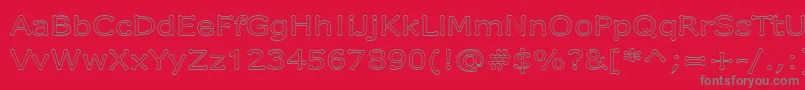 フォントDrummonOutline – 赤い背景に灰色の文字
