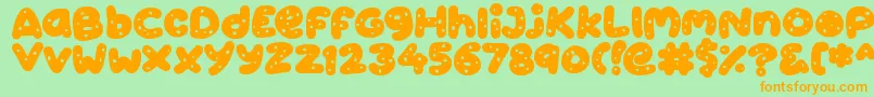 Fonte Cookies – fontes laranjas em um fundo verde