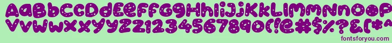 Cookies Font – Purple Fonts on Green Background