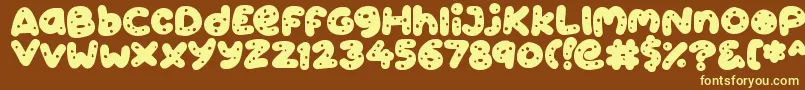 Cookies Font – Yellow Fonts on Brown Background