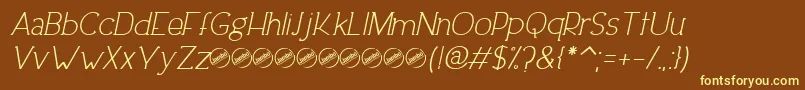 DowntownEleganceItalic-fontti – keltaiset fontit ruskealla taustalla