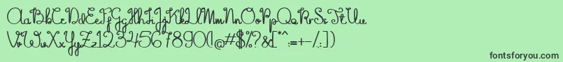 フォントTheFlowerySpring – 緑の背景に黒い文字