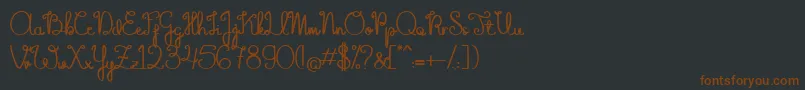 TheFlowerySpring-fontti – ruskeat fontit mustalla taustalla