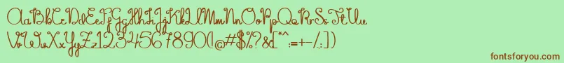 TheFlowerySpring Font – Brown Fonts on Green Background