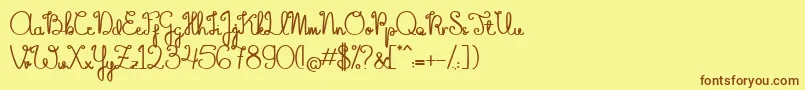 TheFlowerySpring Font – Brown Fonts on Yellow Background