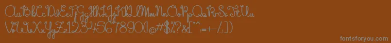 TheFlowerySpring Font – Gray Fonts on Brown Background
