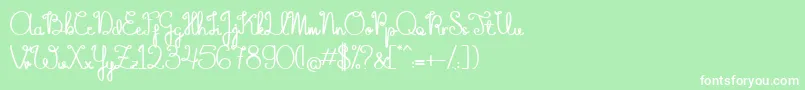フォントTheFlowerySpring – 緑の背景に白い文字