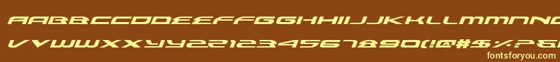 AlexisExpandedItalic-fontti – keltaiset fontit ruskealla taustalla