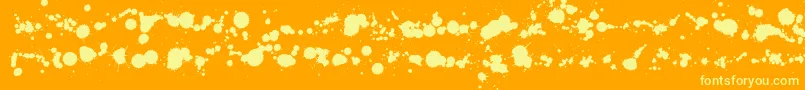 Wcrhesusabta-Schriftart – Gelbe Schriften auf orangefarbenem Hintergrund