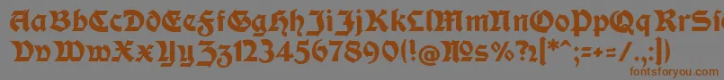 ModerneFetteSchwabachercフォントについての詳細 フォントModerneFetteSchwabacherc – 茶色の文字が灰色の背景にあります。