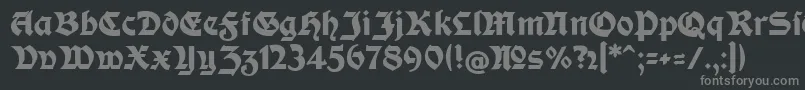 フォントModerneFetteSchwabacherc – 黒い背景に灰色の文字