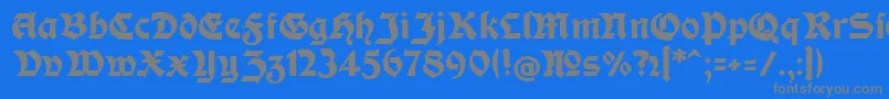 フォントModerneFetteSchwabacherc – 青い背景に灰色の文字