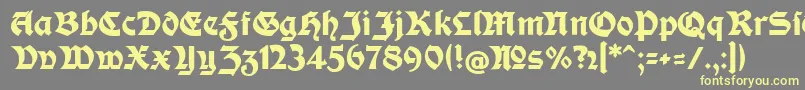 ModerneFetteSchwabacherc-fontti – keltaiset fontit harmaalla taustalla