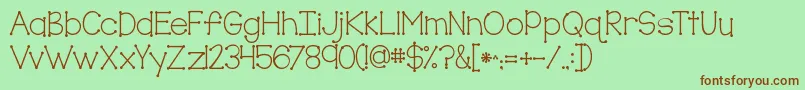 Kgtruecolors Font – Brown Fonts on Green Background