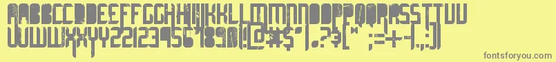 UltimateMidnight-fontti – harmaat kirjasimet keltaisella taustalla