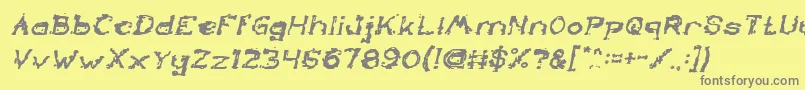 フォントTheLazyDogBoldItalic – 黄色の背景に灰色の文字