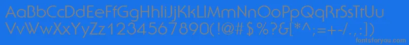 UbiqGothicSsi-fontti – harmaat kirjasimet sinisellä taustalla
