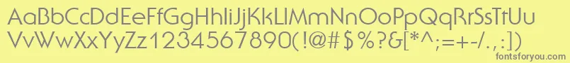 UbiqGothicSsi-fontti – harmaat kirjasimet keltaisella taustalla