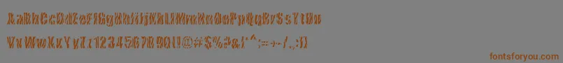 フォントCowsInTheU.S. – 茶色の文字が灰色の背景にあります。