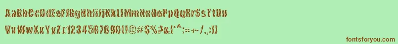 CowsInTheU.S.-Schriftart – Braune Schriften auf grünem Hintergrund